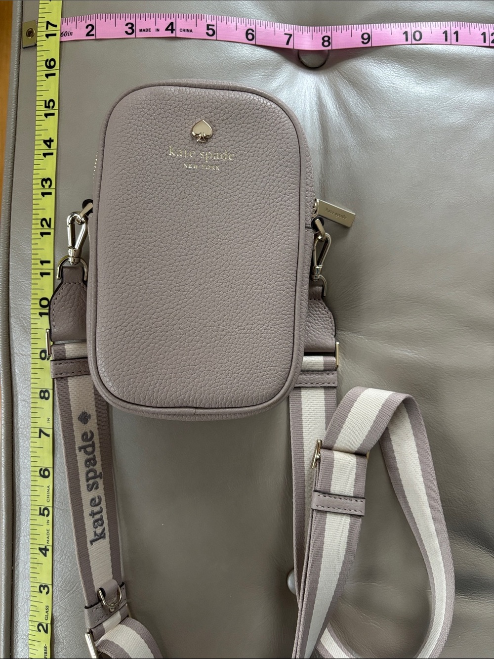 NWOT kate spade taupe pebbled leather phone crossbody with logo strap